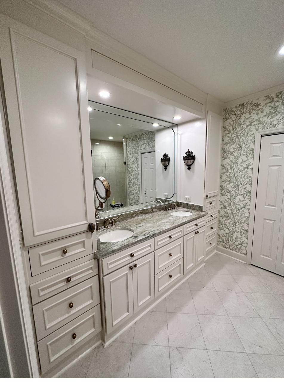 Bathroom — full wall vanity with wallpaper accent