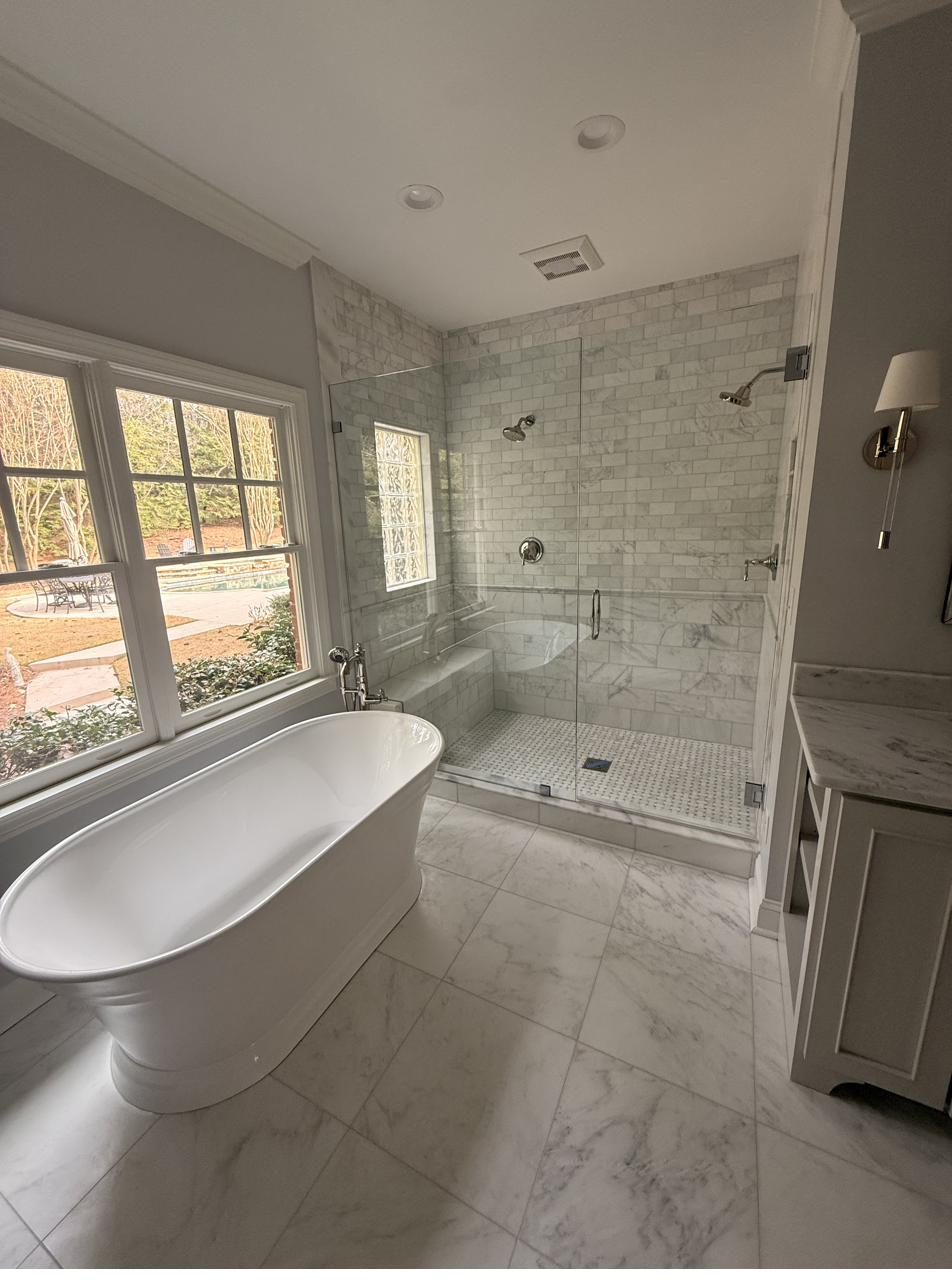 Primary bath — freestanding tub at window