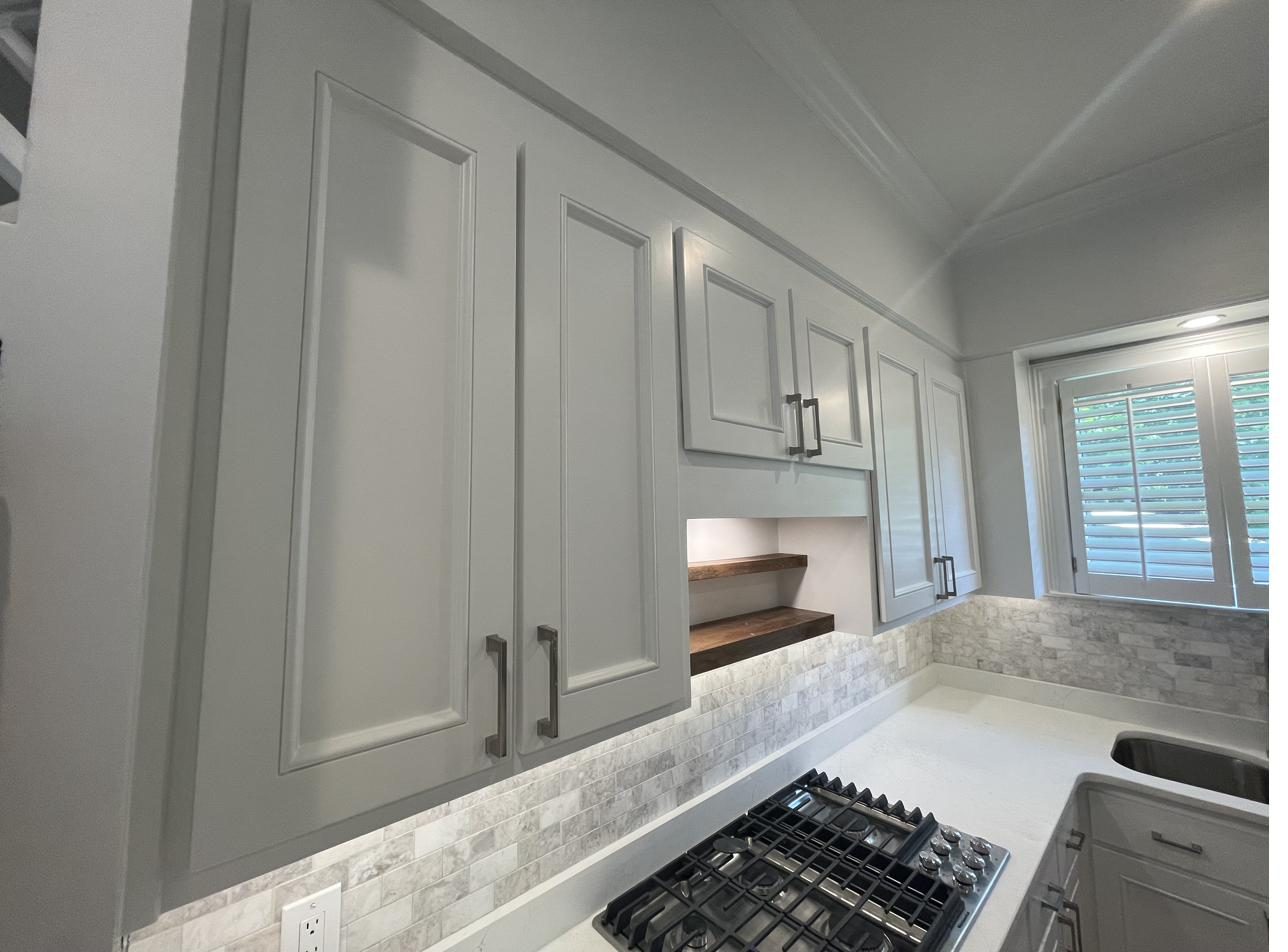 Kitchen — cabinet detail and open shelving