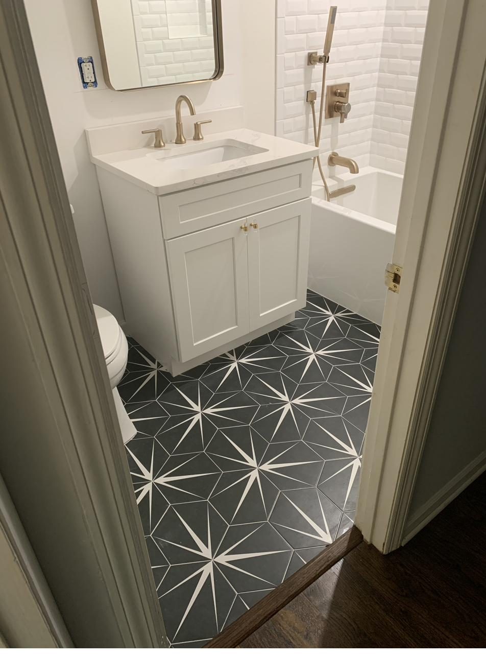 Bathroom — geometric star tile floor